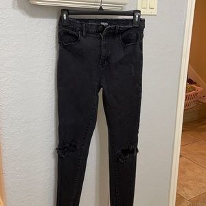 Back skinny jeans with holes at the knees